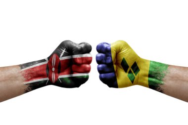 Two hands punch to each others on white background. Country flags painted fists, conflict crisis concept between kenya and saint vincent and the grenadines
