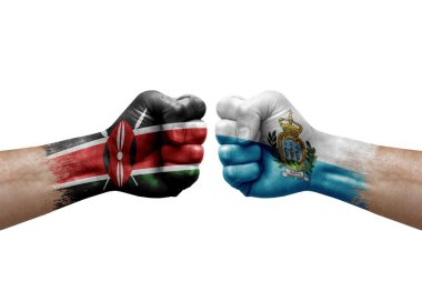 Two hands punch to each others on white background. Country flags painted fists, conflict crisis concept between kenya and san marino