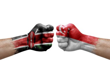 Two hands punch to each others on white background. Country flags painted fists, conflict crisis concept between kenya and singapore