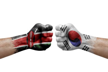 Two hands punch to each others on white background. Country flags painted fists, conflict crisis concept between kenya and south korea