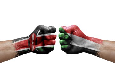Two hands punch to each others on white background. Country flags painted fists, conflict crisis concept between kenya and sudan