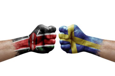 Two hands punch to each others on white background. Country flags painted fists, conflict crisis concept between kenya and sweden