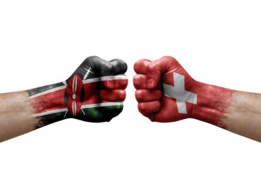 Two hands punch to each others on white background. Country flags painted fists, conflict crisis concept between kenya and switzerland