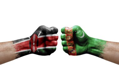 Two hands punch to each others on white background. Country flags painted fists, conflict crisis concept between kenya and turkmenistan