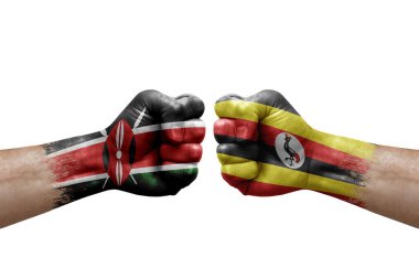 Two hands punch to each others on white background. Country flags painted fists, conflict crisis concept between kenya and uganda