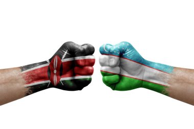 Two hands punch to each others on white background. Country flags painted fists, conflict crisis concept between kenya and uzbekistan