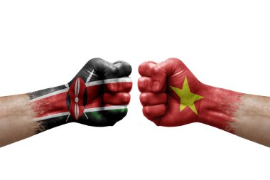 Two hands punch to each others on white background. Country flags painted fists, conflict crisis concept between kenya and vietnam