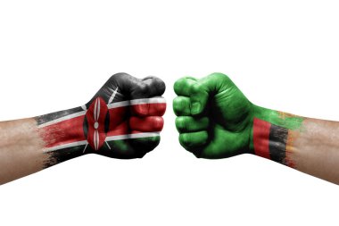 Two hands punch to each others on white background. Country flags painted fists, conflict crisis concept between kenya and zambia
