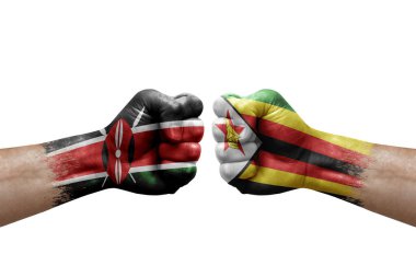 Two hands punch to each others on white background. Country flags painted fists, conflict crisis concept between kenya and zimbabwe