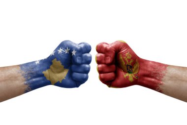 Two hands punch to each others on white background. Country flags painted fists, conflict crisis concept between kosovo and montenegro