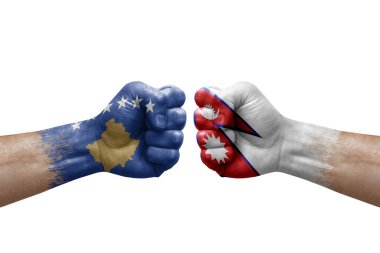 Two hands punch to each others on white background. Country flags painted fists, conflict crisis concept between kosovo and nepal