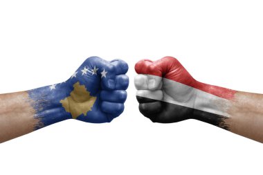 Two hands punch to each others on white background. Country flags painted fists, conflict crisis concept between kosovo and yemen