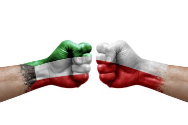 Two hands punch to each others on white background. Country flags painted fists, conflict crisis concept between kuwait and poland