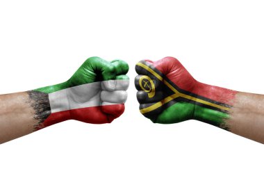 Two hands punch to each others on white background. Country flags painted fists, conflict crisis concept between kuwait and vanuatu