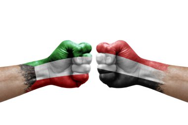 Two hands punch to each others on white background. Country flags painted fists, conflict crisis concept between kuwait and yemen