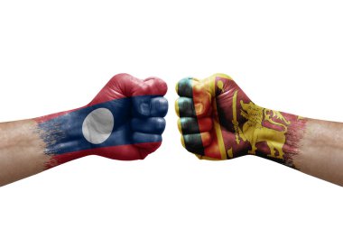 Two hands punch to each others on white background. Country flags painted fists, conflict crisis concept between laos and sri lanka