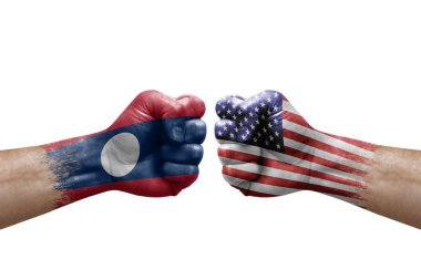Two hands punch to each others on white background. Country flags painted fists, conflict crisis concept between laos and usa