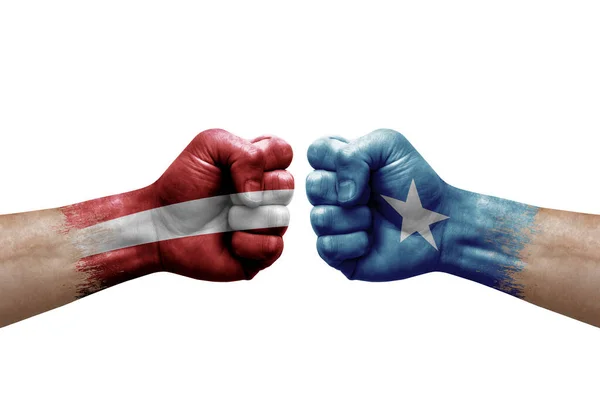 Two Hands Punch Each Others White Background Country Flags Painted — Stockfoto