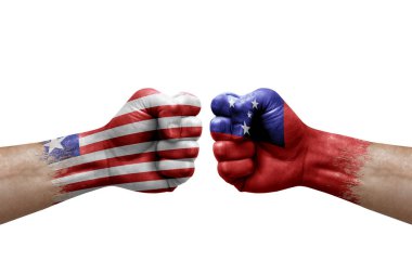 Two hands punch to each others on white background. Country flags painted fists, conflict crisis concept between liberia and samoa