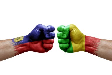 Two hands punch to each others on white background. Country flags painted fists, conflict crisis concept between liechtenstein and mali