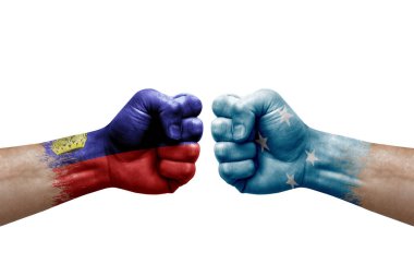 Two hands punch to each others on white background. Country flags painted fists, conflict crisis concept between liechtenstein and micronesia