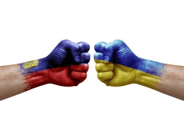 Two hands punch to each others on white background. Country flags painted fists, conflict crisis concept between liechtenstein and ukraine