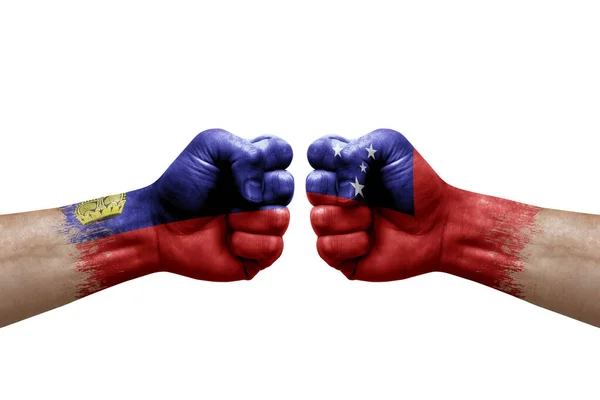 Two Hands Punch Each Others White Background Country Flags Painted — Foto de Stock