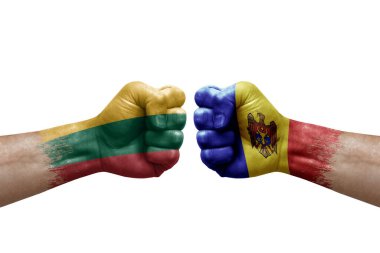 Two hands punch to each others on white background. Country flags painted fists, conflict crisis concept between lithuania and moldova