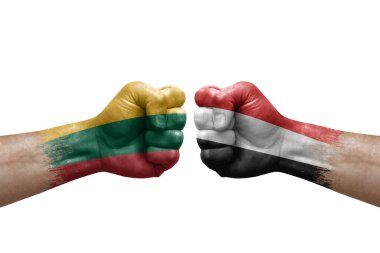 Two hands punch to each others on white background. Country flags painted fists, conflict crisis concept between lithuania and yemen