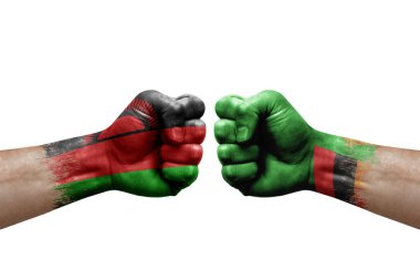 Two hands punch to each others on white background. Country flags painted fists, conflict crisis concept between malawi and zambia
