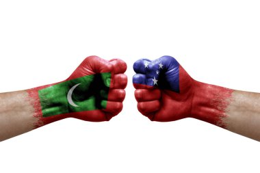 Two hands punch to each others on white background. Country flags painted fists, conflict crisis concept between maldives and samoa