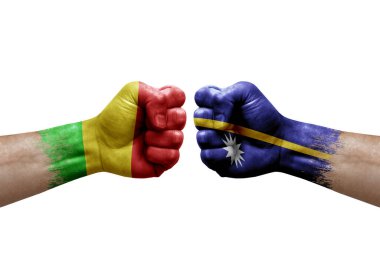 Two hands punch to each others on white background. Country flags painted fists, conflict crisis concept between mali and nauru