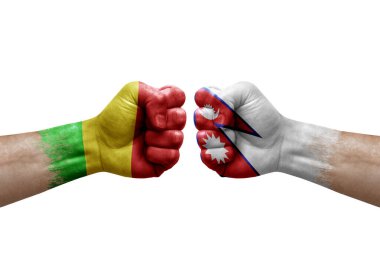 Two hands punch to each others on white background. Country flags painted fists, conflict crisis concept between mali and nepal