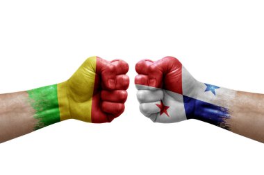 Two hands punch to each others on white background. Country flags painted fists, conflict crisis concept between mali and panama