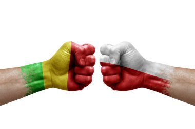 Two hands punch to each others on white background. Country flags painted fists, conflict crisis concept between mali and poland