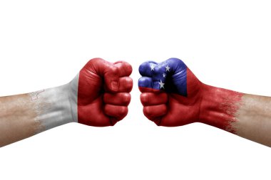 Two hands punch to each others on white background. Country flags painted fists, conflict crisis concept between malta and samoa