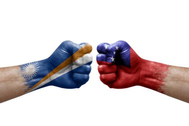 Two hands punch to each others on white background. Country flags painted fists, conflict crisis concept between marshall islands and samoa