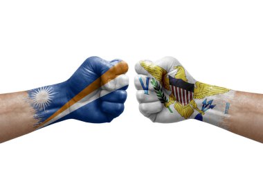 Two hands punch to each others on white background. Country flags painted fists, conflict crisis concept between marshall islands and virgin islands