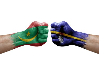 Two hands punch to each others on white background. Country flags painted fists, conflict crisis concept between mauritania and nauru