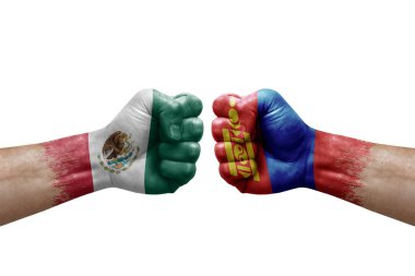 Two hands punch to each others on white background. Country flags painted fists, conflict crisis concept between mexico and mongolia