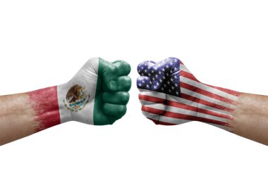 Two hands punch to each others on white background. Country flags painted fists, conflict crisis concept between mexico and usa