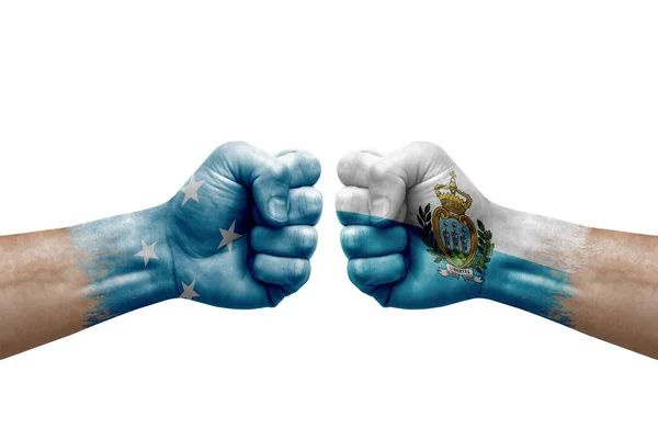 Two Hands Punch Each Others White Background Country Flags Painted — Stockfoto