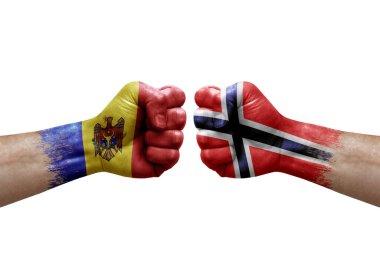 Two hands punch to each others on white background. Country flags painted fists, conflict crisis concept between moldova and norway