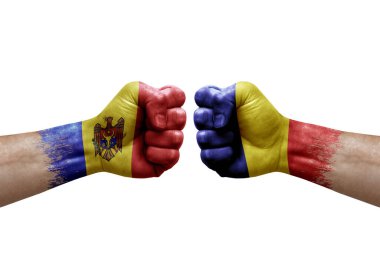 Two hands punch to each others on white background. Country flags painted fists, conflict crisis concept between moldova and romania
