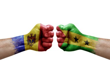 Two hands punch to each others on white background. Country flags painted fists, conflict crisis concept between moldova and sao tome and principe