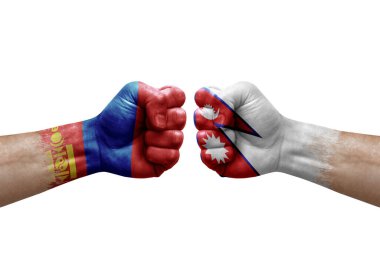 Two hands punch to each others on white background. Country flags painted fists, conflict crisis concept between mongolia and nepal