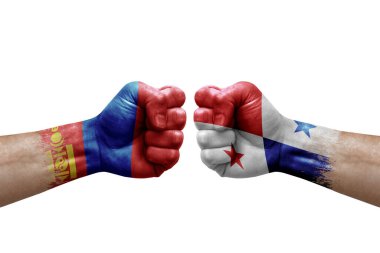 Two hands punch to each others on white background. Country flags painted fists, conflict crisis concept between mongolia and panama