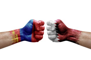 Two hands punch to each others on white background. Country flags painted fists, conflict crisis concept between mongolia and qatar