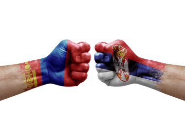 Two hands punch to each others on white background. Country flags painted fists, conflict crisis concept between mongolia and serbia