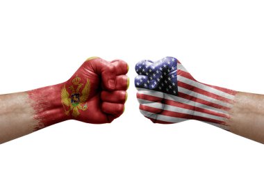 Two hands punch to each others on white background. Country flags painted fists, conflict crisis concept between montenegro and usa